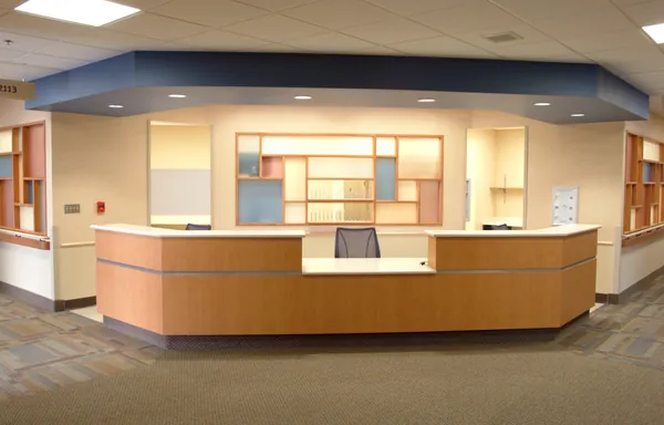 Reception desk with decorative screen at HCGH.