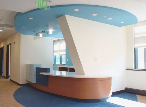 Curved blue reception desk at Kennedy Krieger.