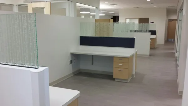 Workstations with glass dividers at SAH Route 40.