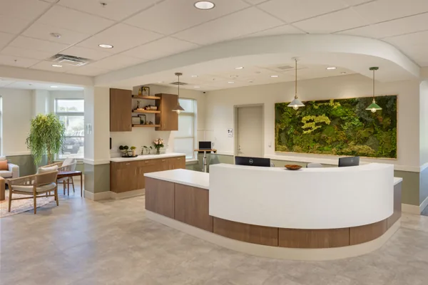 Curved station and cabinetry at Alpas Wellness.