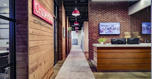 Reception desk and entry corridor at Chesapeake Contracting Group – Annapolis.